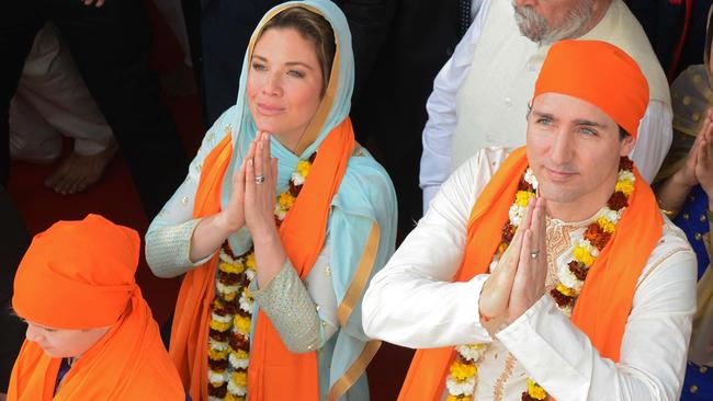 Canadian Prime Minister Justin Trudeau along with his wife Sophie Gregoire in India. / AFP PHOTO / NARINDER NANU