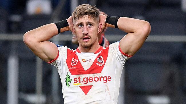 Corey Norman, Zac Lomax and Tyson Frizell of the Dragons react after conceding a try during the Round 7 NRL match between the Sydney Roosters and the St George Illawarra Dragons at Bankwest Stadium in Sydney, Friday, June 26, 2020. (AAP Image/Dan Himbrechts) NO ARCHIVING, EDITORIAL USE ONLY