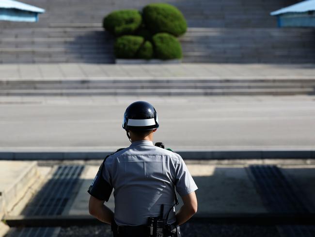 A South Korean soldier stands guard at the border village of Panmunjom between South and North Korea at the Demilitarized Zone (DMZ) Picture: Chung Sung-Jun / Getty