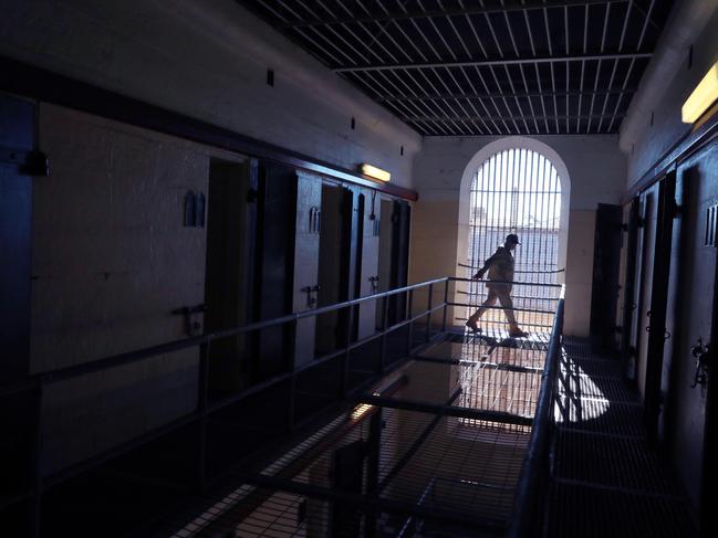 PARRAMATTA ADVERTISER/AAP. Site Officer Peter Brown inspects the upper levels of Wing 6 for anything out of place at the Old Parramatta Gaol in North Parramatta. North Parramatta, Friday 31 May, 2019. Feature on Old Parramatta Gaol. Deerubbin Land Council CEO Stephen Wright at the wing of the old gaol where he's encountered some paranormal activities. (AAP IMAGE / Angelo Velardo)