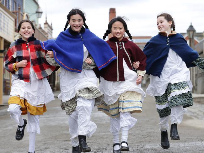 Sovereign Hill tourism pic for Bush Summit feature. Genazzano FCJ College students Eliza Hughes, Grace Lui, Sonia Zhuang and Isabella Emmitt dress up in costume on Main Street.                     Picture: David Caird