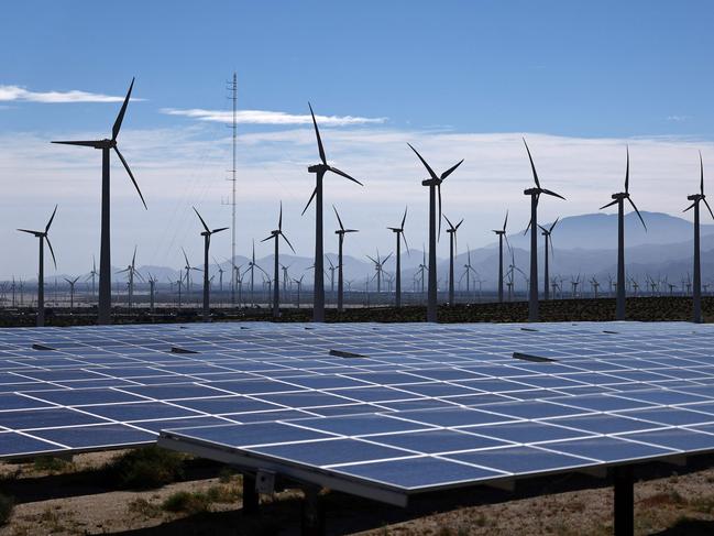 PALM SPRINGS, CALIFORNIA - MARCH 06: Wind turbines operate at a wind farm near solar panels on March 06, 2024 near Palm Springs, California.   Mario Tama/Getty Images/AFP (Photo by MARIO TAMA / GETTY IMAGES NORTH AMERICA / Getty Images via AFP)