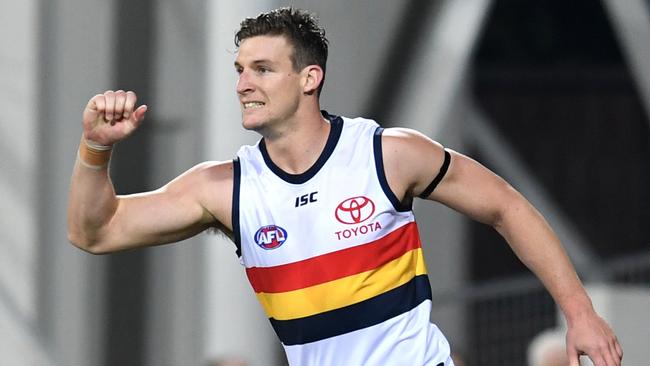 Josh Jenkins of the Crows celebrates a goal.