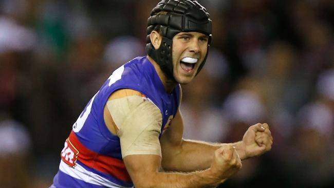 MELBOURNE, AUSTRALIA - APRIL 2: Caleb Daniel of the Bulldogs celebrates a goal during the 2016 AFL Round 02 match between the St Kilda Saints and the Western Bulldogs at Etihad Stadium, Melbourne on April 2, 2016. (Photo by Michael Willson/AFL Media/Getty Images)