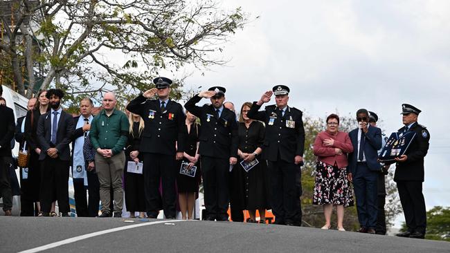 Mourners after Thursday’s funeral. Picture: Lyndon Mechielsen/Courier Mail