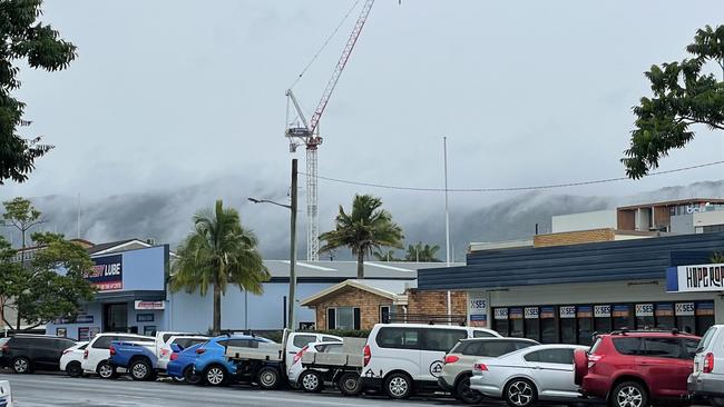 The huge crane towering over the construction site of a 13-storey residential and commercial development at Coffs Harbour, driven by the C.ex club. May 2023. Picture: Chris Knight