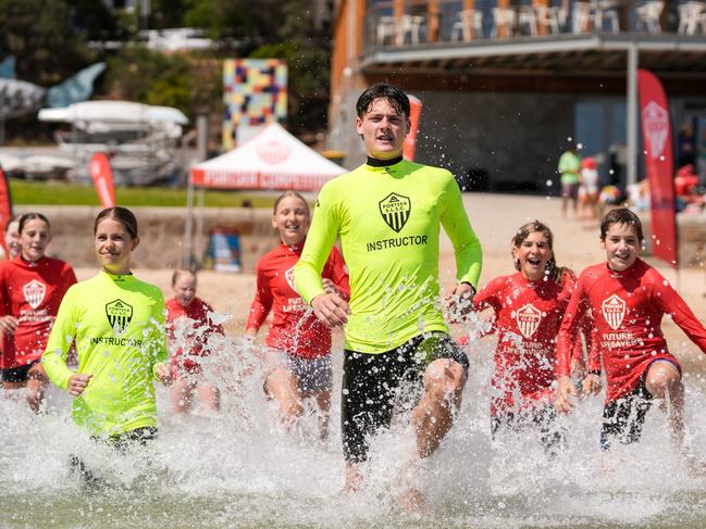 Beach safety: Henry Code and Lainey Jones teach Sorrento Primary School stduents beach skills as part of the United Energy Portsea Centre of Excellence Program at Sorrento Sailing Couta Boat Club on November 22, 2024. MUST CREDIT Picture Henry Yates.