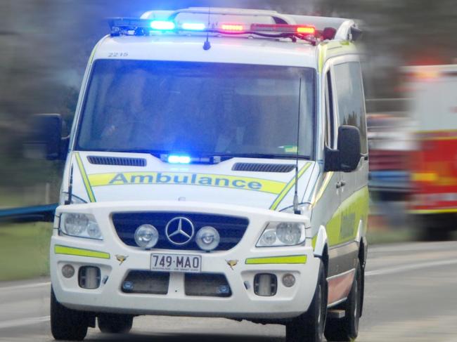 Ambulance with lights on. Photo Tony Martin / Daily Mercury