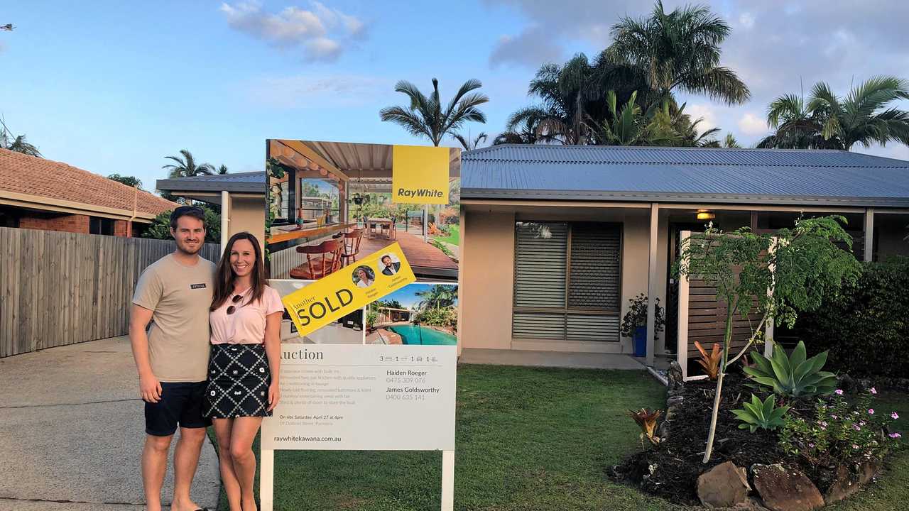 GREAT DEAL: Cherie Ellis, right, bought her first home in Parrearra at auction in April. She's here with her partner, Daniel Peyre. Picture: Contributed