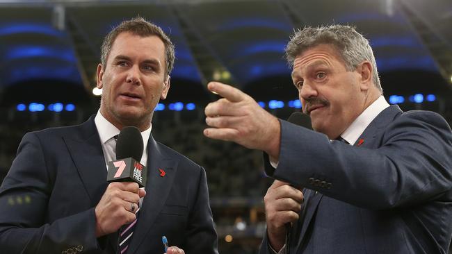 Brian Taylor in action calling the footy with Wayne Carey. Picture: Getty Images