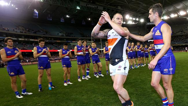 GWS’ thrilling win over the Bulldogs in 2014 was also the farewell games for Bulldog Daniel Giansiracusa and former Cat turned Giant Josh Hunt. Picture: Michael Klein