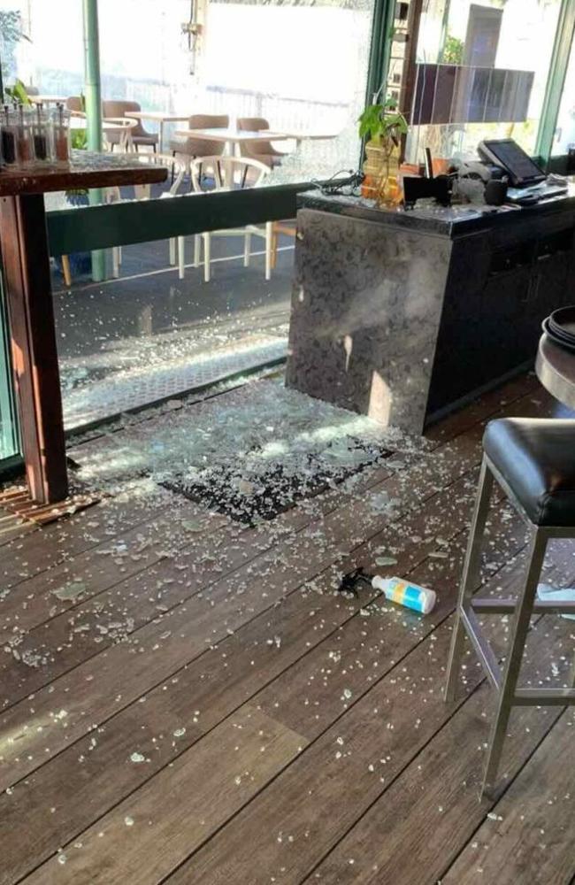 Windows of Hervey Bay's Cafe Balaena were smashed in February.