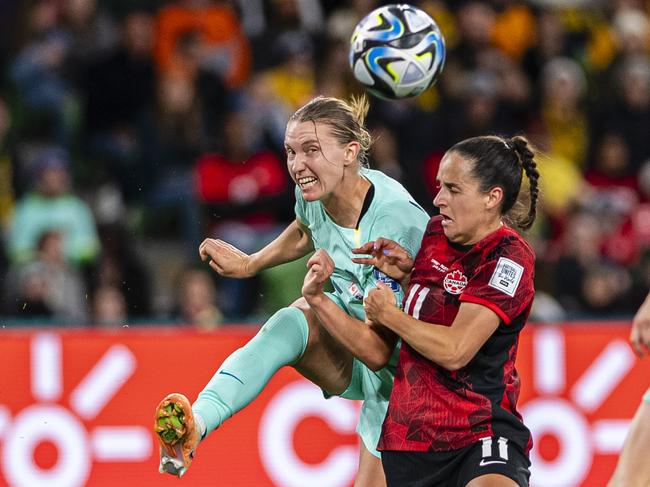 MELBOURNE, AUSTRALIA - JULY 31: Clare Hunt of Australia (L) battles for the ball with Evelyne Viens of Canada (R) during the FIFA Women's World Cup Australia & New Zealand 2023 Group B match between Canada and Australia at Melbourne Rectangular Stadium on July 31, 2023 in Melbourne, Australia. (Photo by Richard Callis/Eurasia Sport Images/Getty Images)