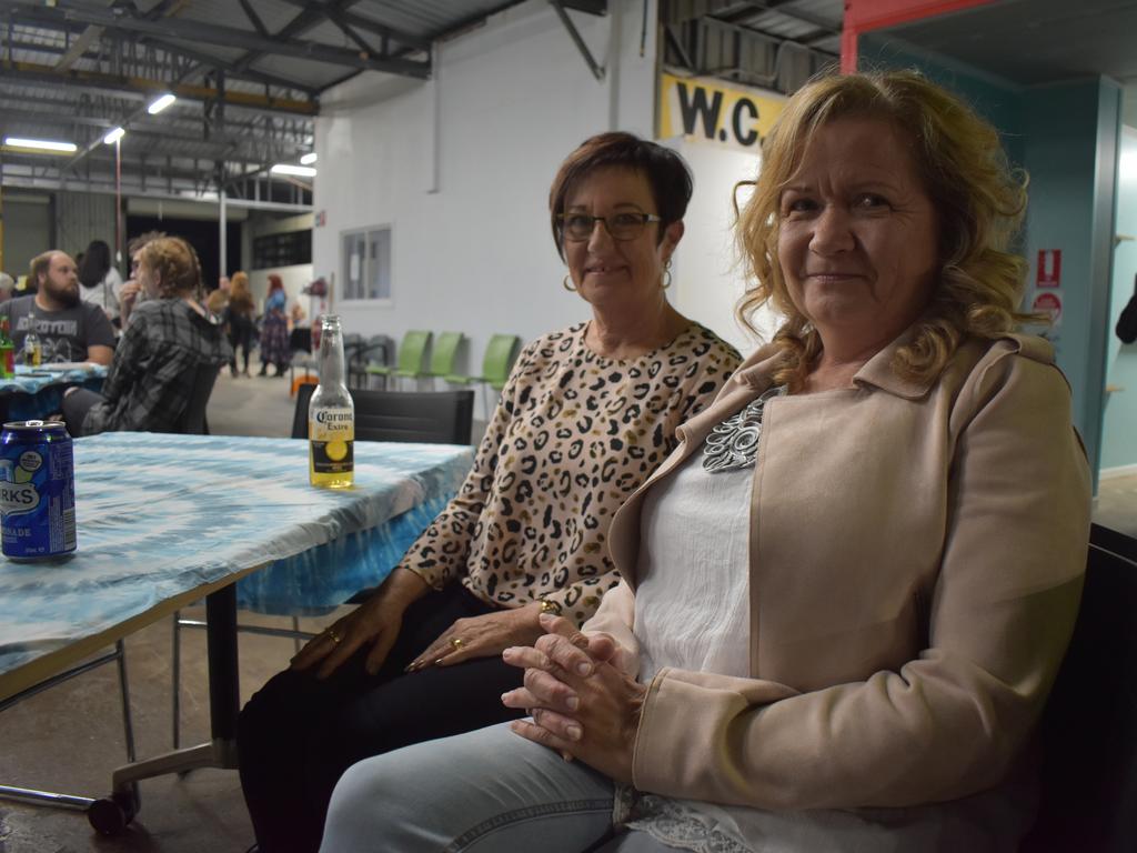 (L) Dianne Clarke and Maree Twomey enjoy the opening of the Neighbourhood Hive on Friday night. Photo: Stuart Fast