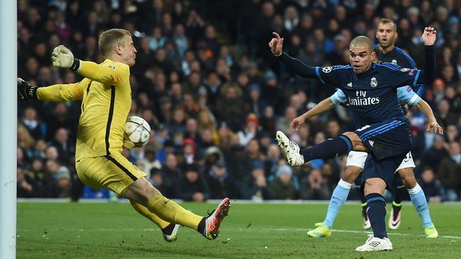 Manchester City goalkeeper Joe Hart makes a save.