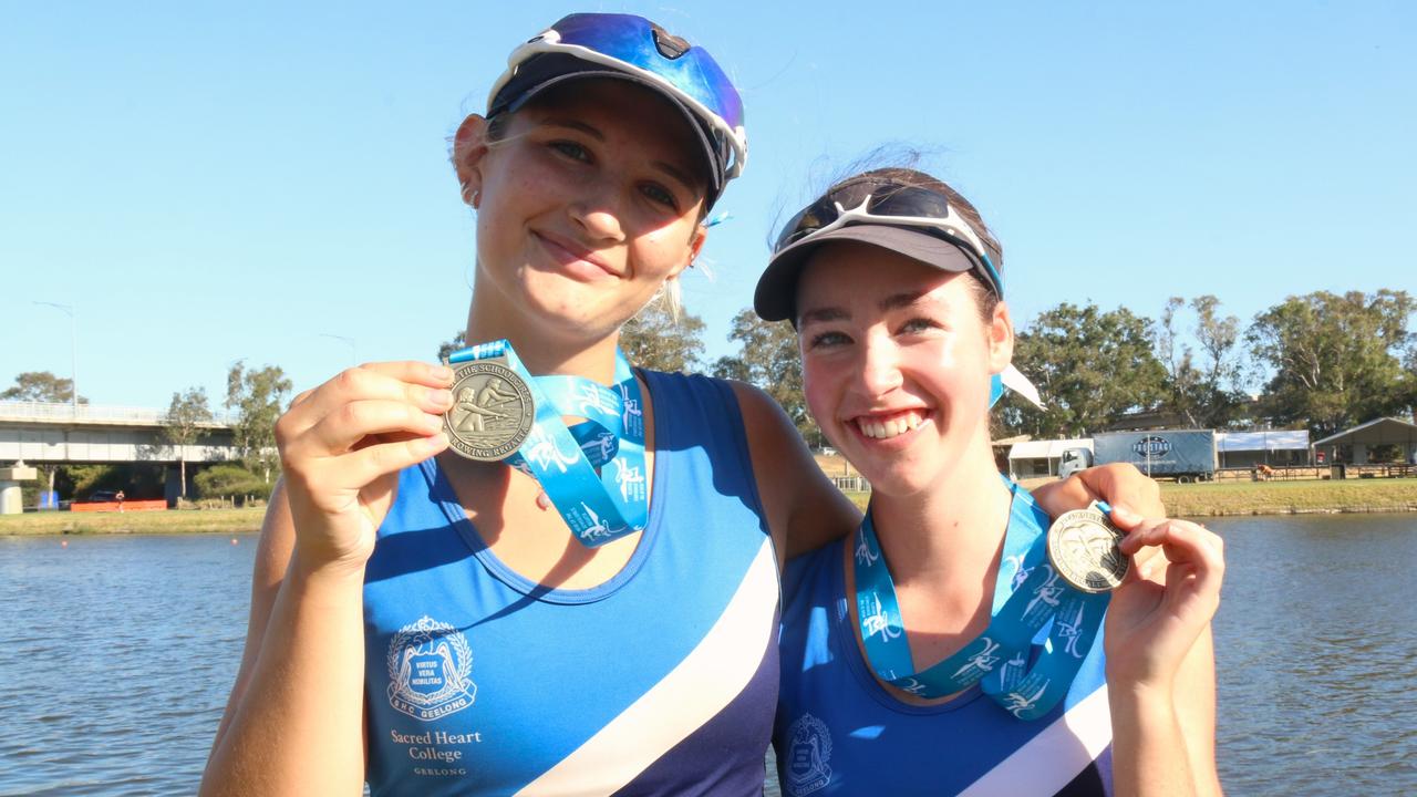 Sacred Heart College's Rio Smith (left) celebrates Head of the Schoolgirls gold last year with Laura Ahearn. Picture: Meg Saultry