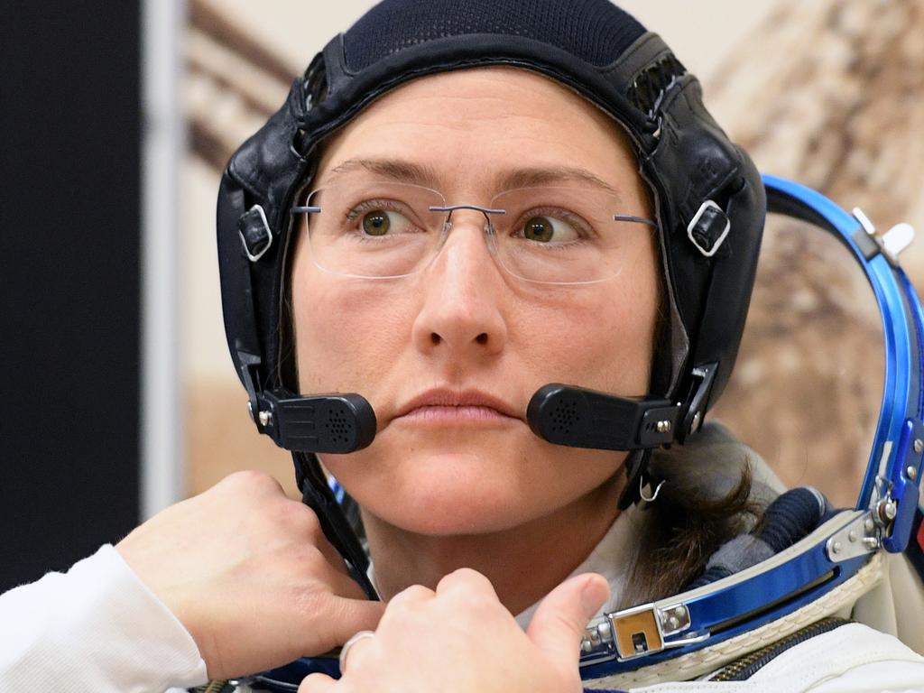 NASA astronaut Christina Koch looks on as her spacesuit is tested prior to her trip to the ISS. Picture: AFP