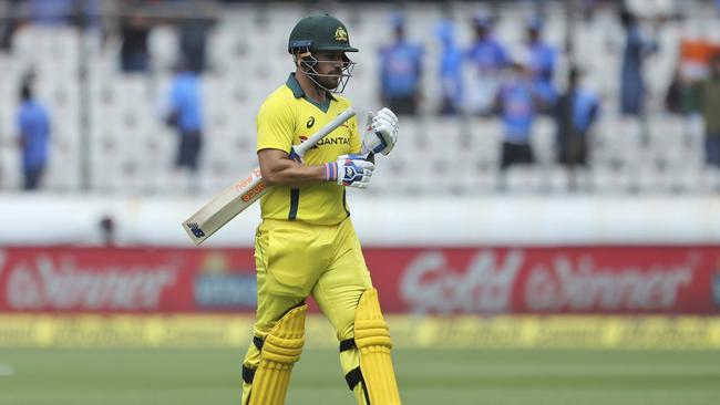 Aaron Finch leaves the field after being dismissed by India's Jasprit Bumrah. Picture: AP