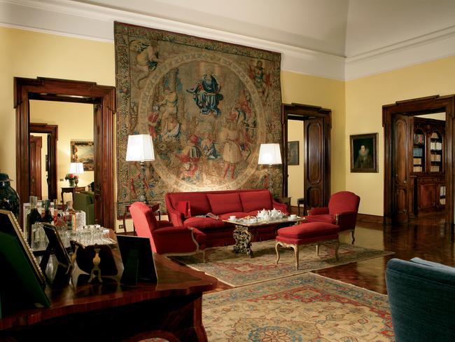 Flemish tapestries and antiques are features of the decor.