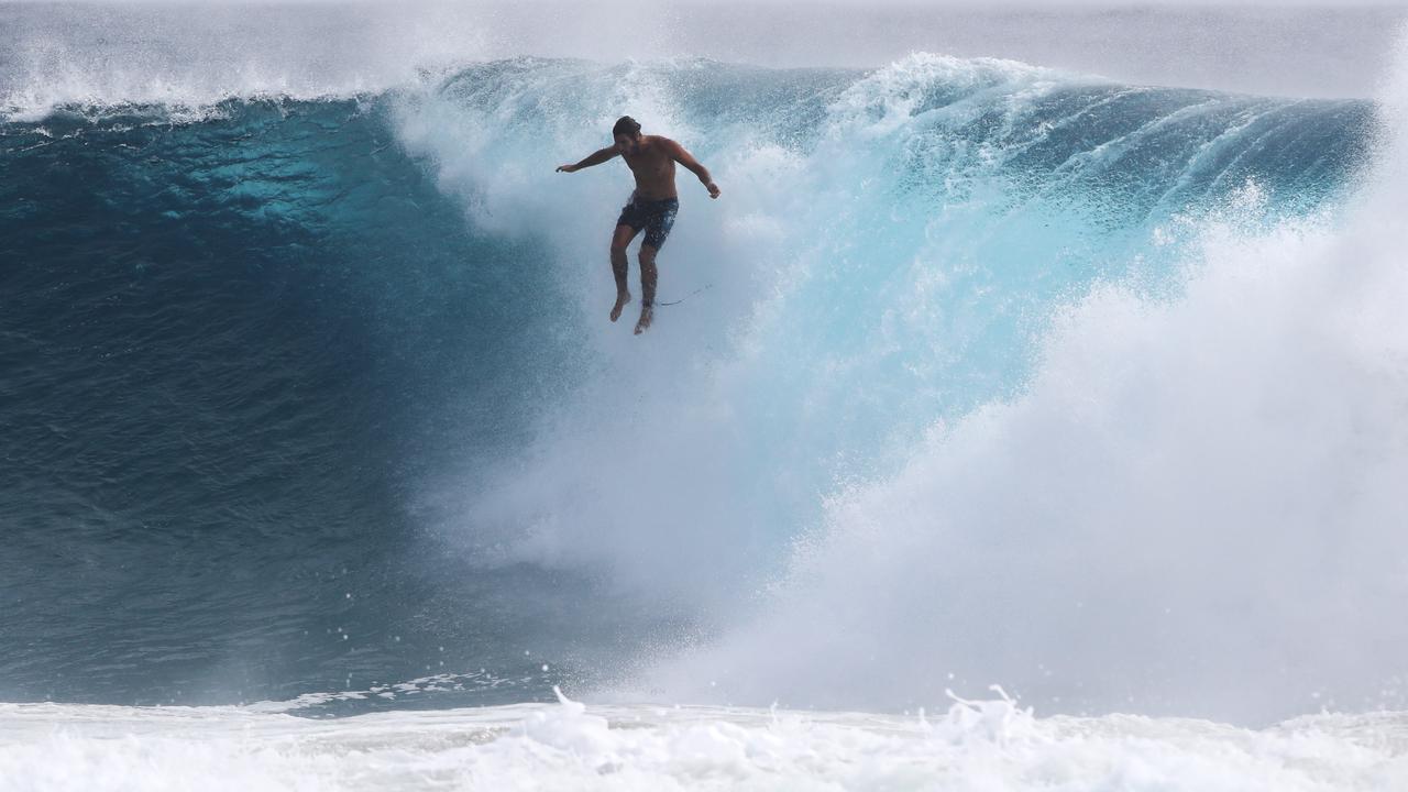 Surf's up: Cyclone brings big waves to Coast