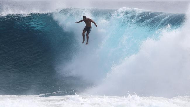 Surfers at Snapper Rocks and Kirra riding the Large swell produced by   Cyclone OMA.Photograph : Jason O'Brien