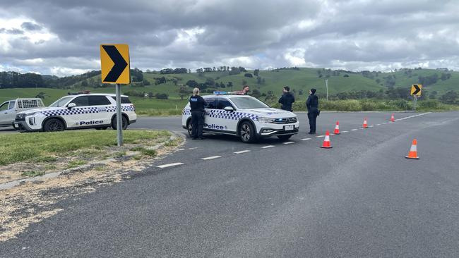 Police block off Foster Mirboo Rd as a major incident unfolds in Dumbalk North. Emergency services received reports that shots had been fired. Picture: Jack Colantuono.