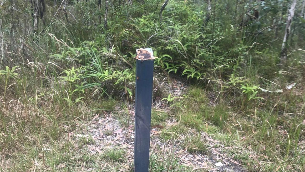 The Tin Can Bay vandals ripped off the bird information signs and other signs off their posts, while also graffitiing on other community property including a public seat. Pictures: Daryll McLaren.