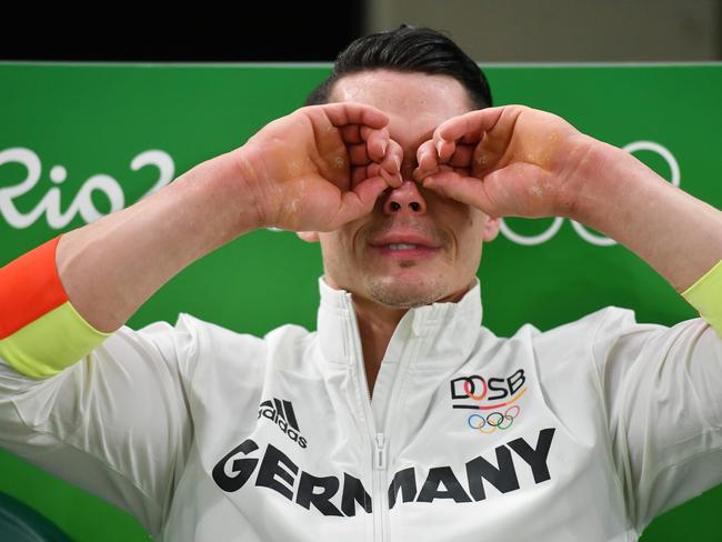 Germany’s Andreas Toba cries during the qualifying for the men’s Artistic Gymnastics at the Olympic Arena