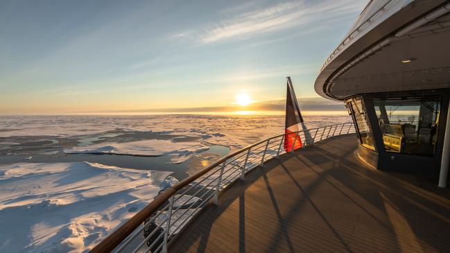 Sailing into the Arctic sun on the ship’s first voyage.