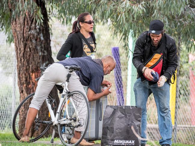 People appear to use drugs in front of Richmond West Primary School. Picture: Jake Nowakowski