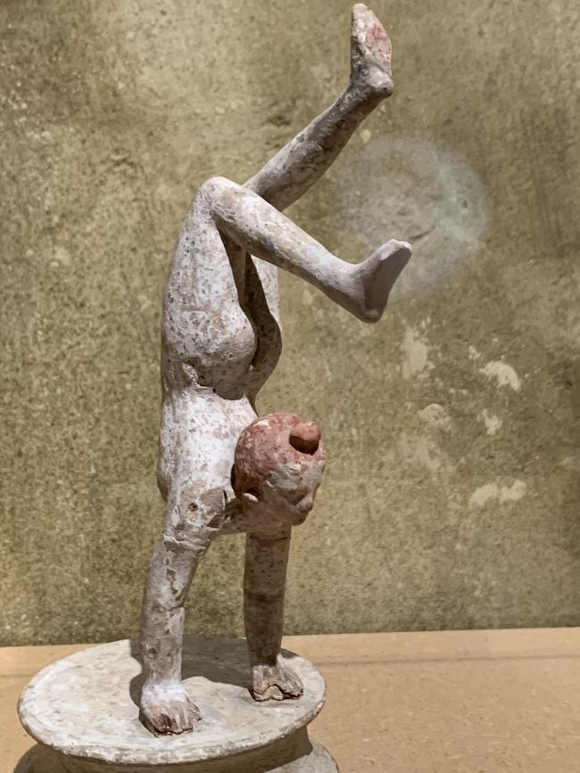 Terracotta figurine of acrobat, late 4th century BC. Picture: Christopher Allen