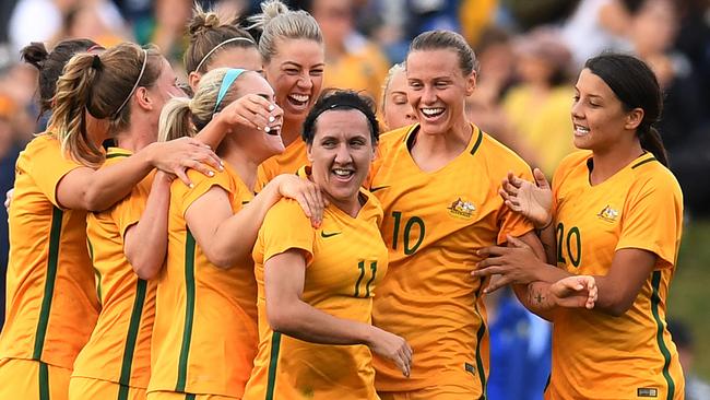 Lisa De Vanna celebrates her opening goal against Brazil.