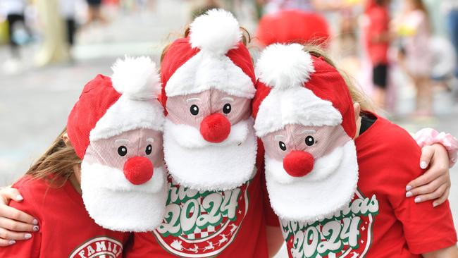 Hannah Beagley, 6, Chelsea Beagley, 9 and Hannah Cattanach, 10, at the National Pharmacies Christmas Pageant. Picture: Keryn Stevens