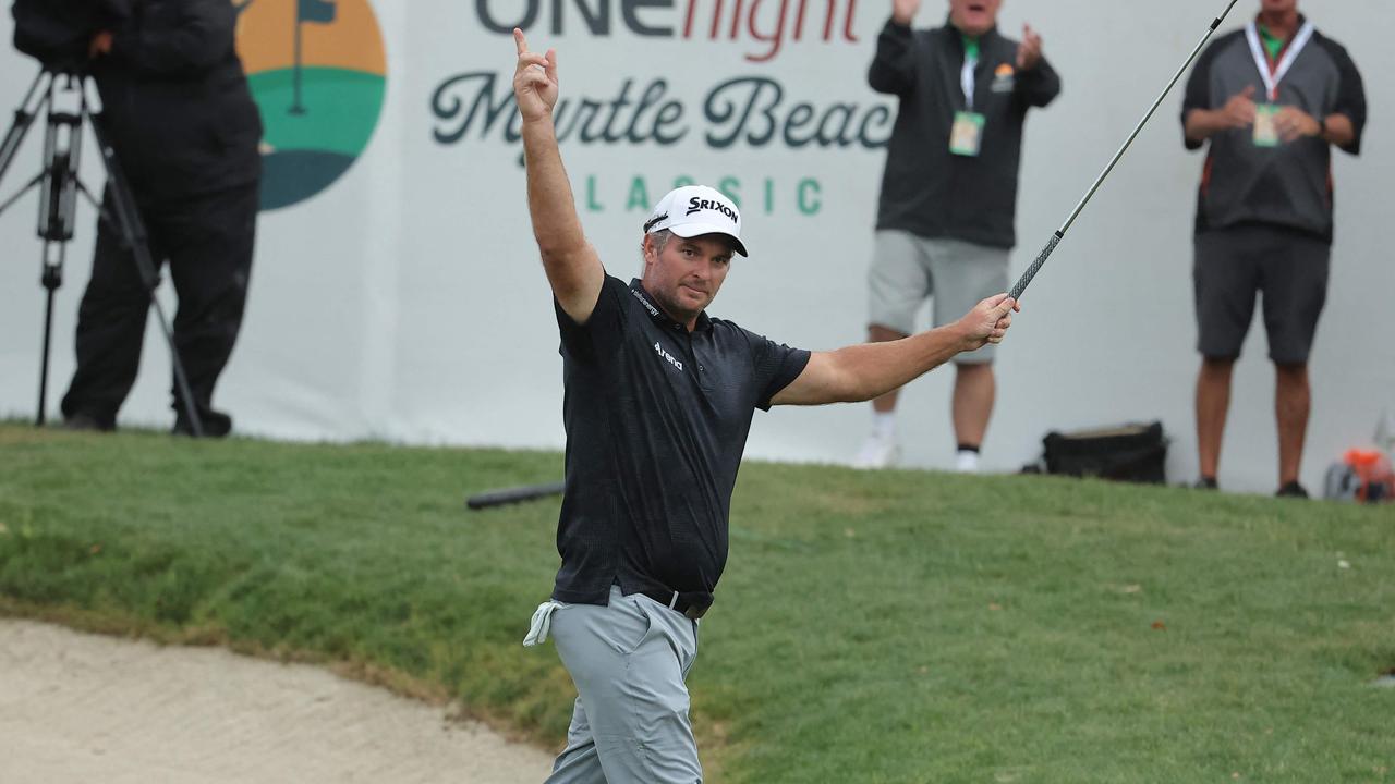 MYRTLE BEACH, SOUTH CAROLINA: Ryan Fox of New Zealand reacts after chipping in on the 18th green.