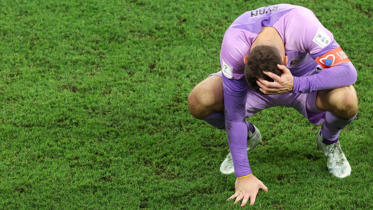 DOHA, QATAR – DECEMBER 03: Mathew Ryan of Australia shows dejection after the 1-2 defeat in the FIFA World Cup Qatar 2022 Round of 16 match between Argentina and Australia at Ahmad Bin Ali Stadium on December 03, 2022 in Doha, Qatar. (Photo by Alexander Hassenstein/Getty Images)