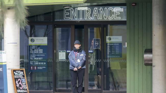 A security guard outside the safe injecting room at North Richmond community centre. Picture by Wayne Taylor 3rd July 2018.