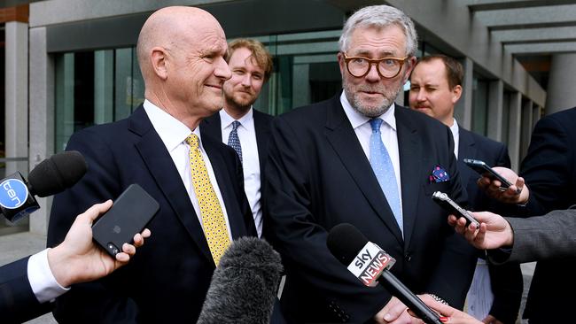 Former Liberal Democratic senator David Leyonhjelm speaks to media with Anthony Morris QC outside the Commonwealth Law Courts in Adelaide last year. Picture: AAP / Mark Brake