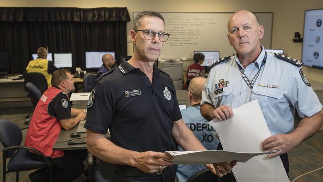 Darling Downs Disaster Management Officer Senior Sergeant Craig Berry (left) and Inspector Scott Stahlhut in the Darling Downs District Disaster Coordination Centre as emergency services prepare for the arrival of the weather system associated with TC Alfred, Thursday, March 6, 2025. Picture: Kevin Farmer