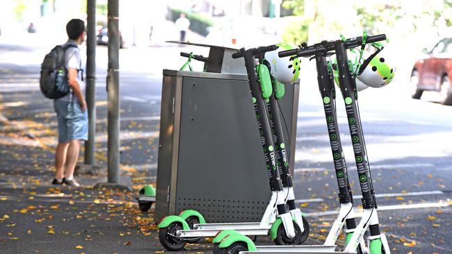 There are new calls for e-scooters, such as those provided by Lime, to be banned in Brisbane. Picture: AAP image, John Gass