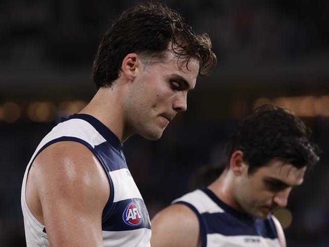 MELBOURNE, AUSTRALIA - AUGUST 17:  Dejected Geelong players walk from the ground after the round 23 AFL match between St Kilda Saints and Geelong Cats at Marvel Stadium, on August 17, 2024, in Melbourne, Australia. (Photo by Darrian Traynor/Getty Images)