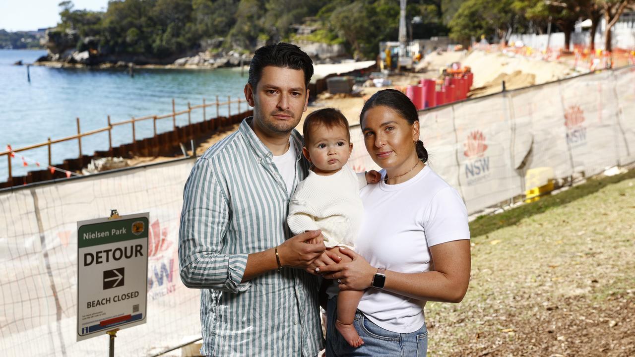 Marcus and Gabi Kosmin with their 9 month old daughter Jordan. They have been waiting three years for access to the beach while construction has been delayed on the project due to government and contractor issues. Picture: Richard Dobson