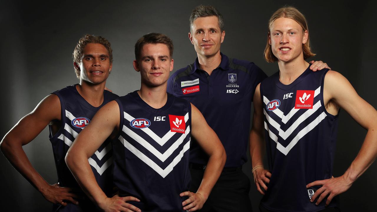 Fremantle coach Justin Longmuir with 2019 draftees Liam Henry, Caleb Serong and Hayden Young. Picture: Michael Klein