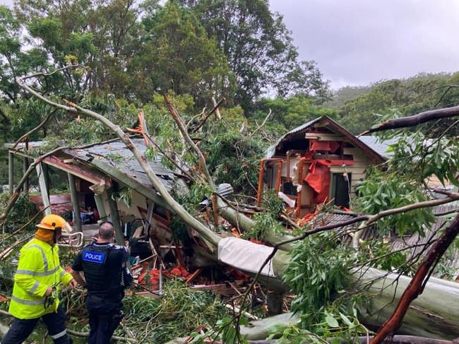 Cyclone Alfred, 2025. A house has been crushed by a tree at Currumbin Valley. Picture: Qld Ambulance Service, Facebook.