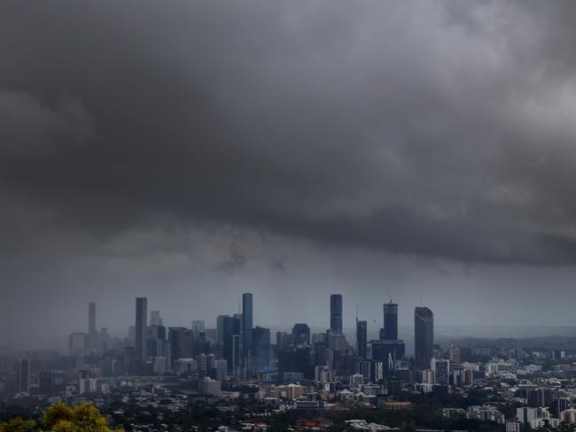 Dark clouds are pictured over the Brisbane CBD on a stormy day in Brisbane Mt Coot tha Thursday 11th January 2024 Picture David Clark