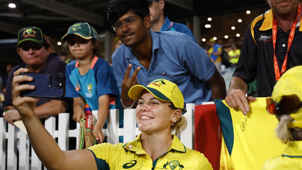 Georgia Voll of Australia takes a selfie with the fans after the win during game three of the Women's ODI Series between Australia and India at WACA on December 11, 2024 in Perth, Australia. (Photo by James Worsfold/Getty Images)