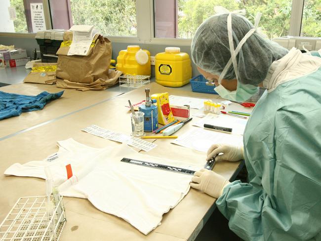 The John Tonge Centre at the QLD Forensic and Scientific services building in Brisbane. Unidentified (names withheld) scientists working in the forensic science laboratory.