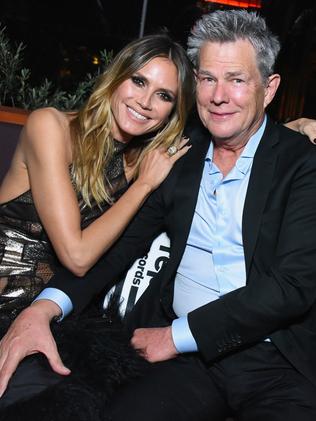 Model Heidi Klum and musician David Foster celebrate at the Republic Records after-party. Picture: Getty