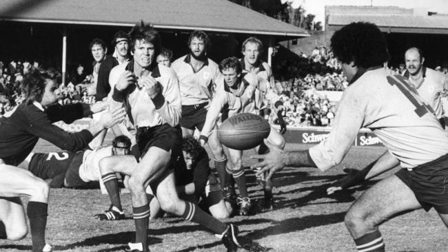 Stephen James passes the ball to Glen Ella during Sydney’s clash against Scotland at the SCG in 1982 Picture: Ian Mainsbridge