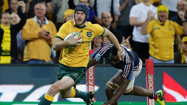 Pat McCabe scores. The Wallabies vs France at Suncorp Stadium in Brisbane. Pic Peter Wallis