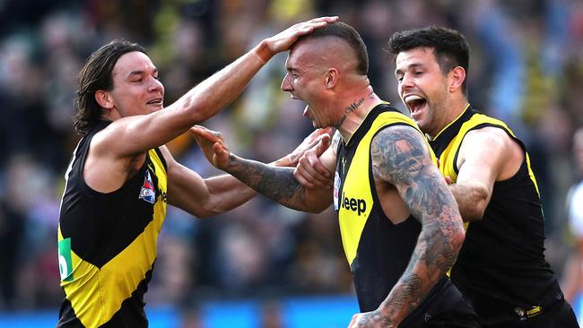 A pat on the head for Richmond's Dustin Martin after last quarter goal during the AFL Grand Final between the GWS Giants and Richmond Tigers at the MCG on September 28, 2019 in Melbourne. Picture. Phil Hillyard